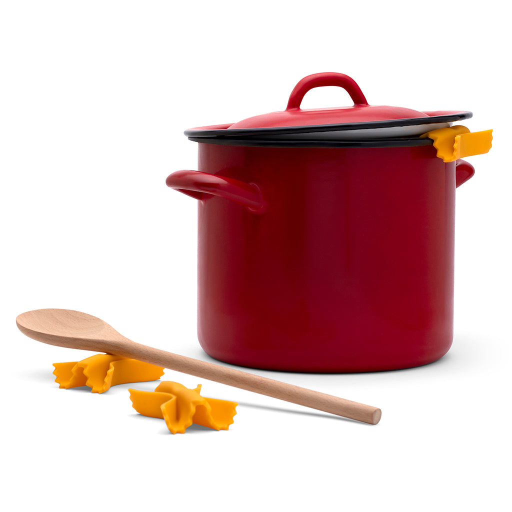 Kitchen steam tool shaped like pasta resting on pot rim
by Monkey Business