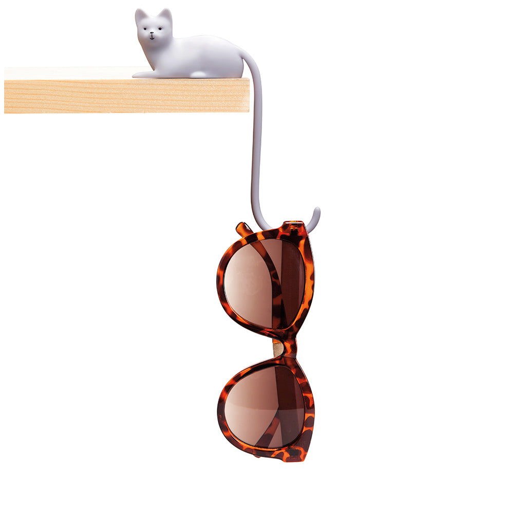 White Ginger screen hook with 3M adhesive Tail-shaped hook hanging from a shelf with a headphone wire by Monkey Business 