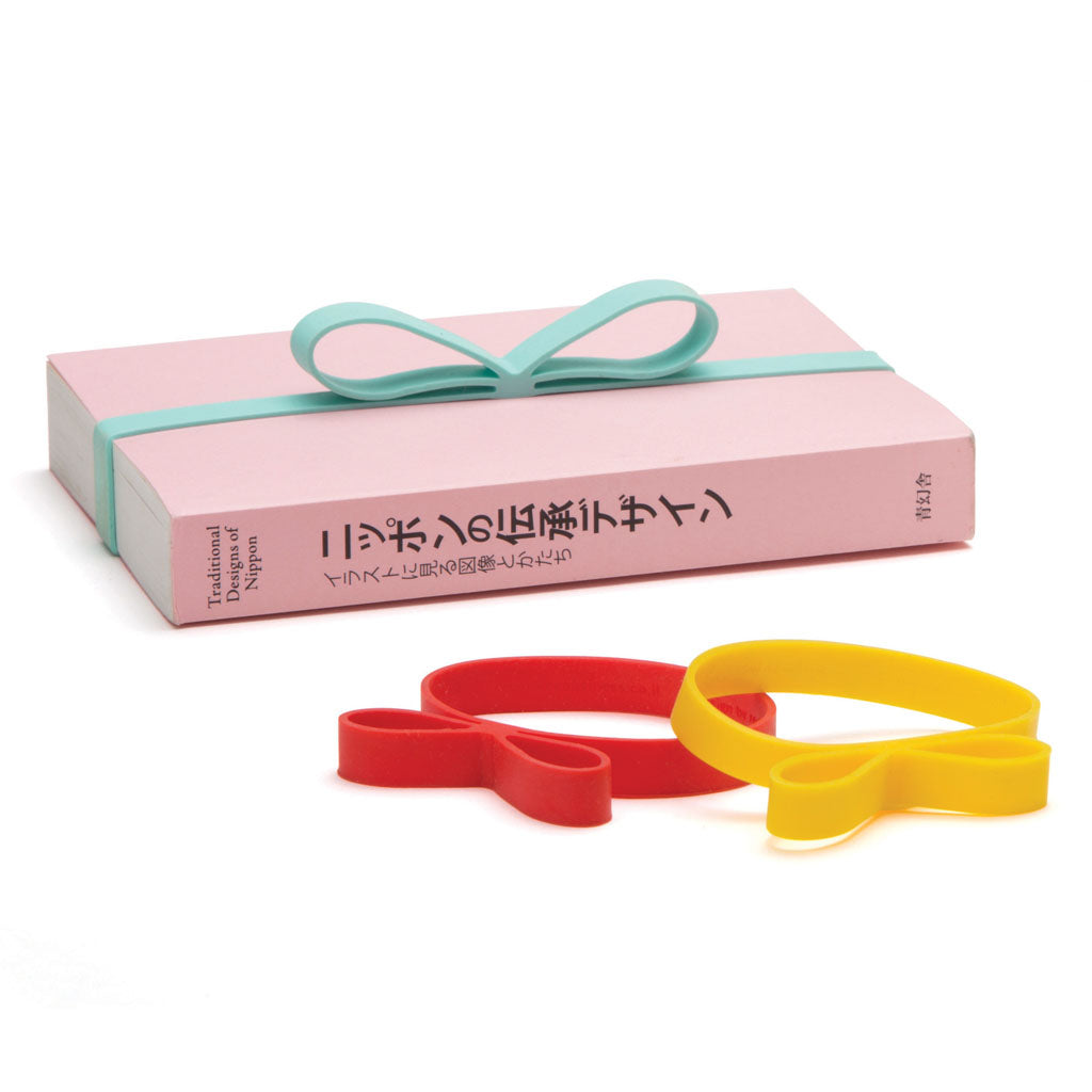 multicolour silicone gift ribbons set to a book by Monkey Business