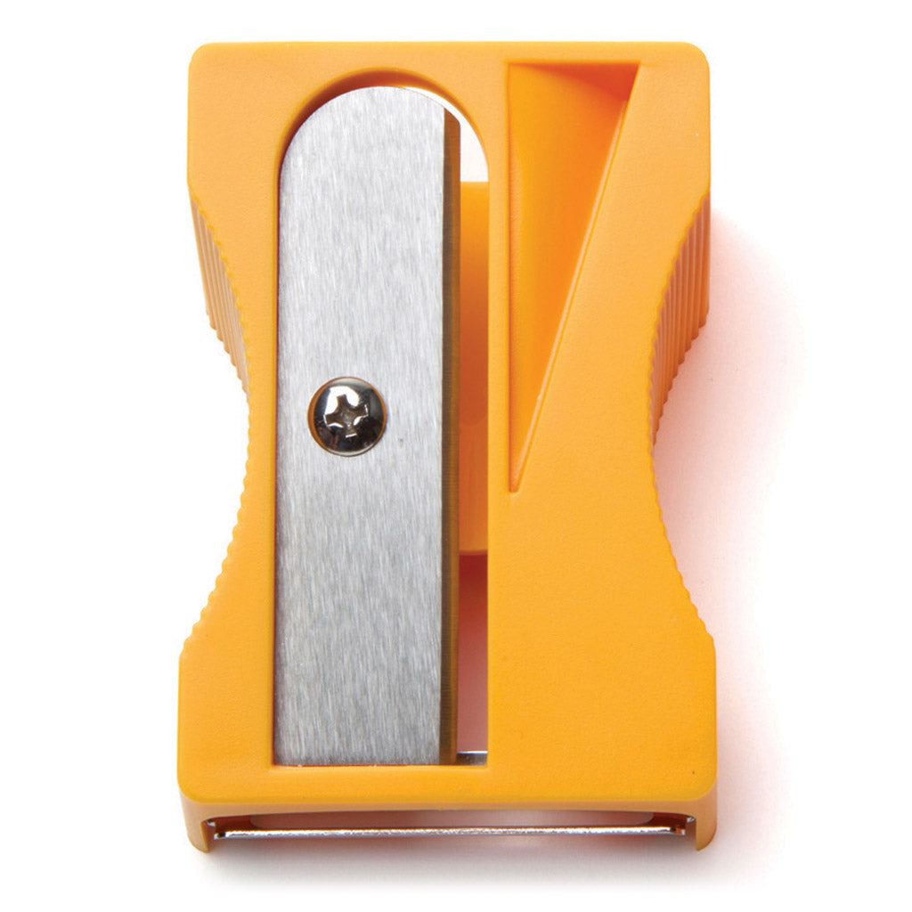 Pencil-style veggie peeler shaping vegetables into ribbons