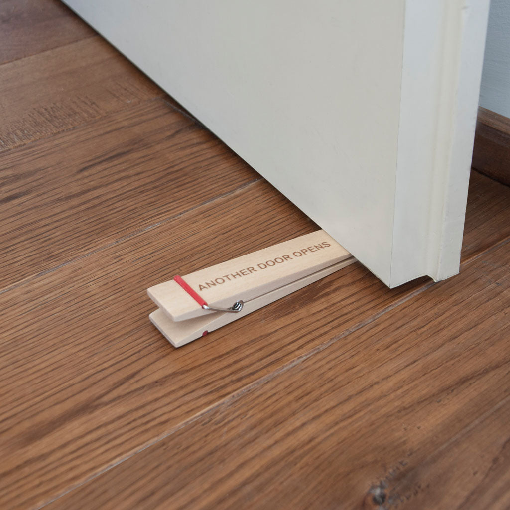 OPENING | Doorstopper with a message - Monkey Business USA